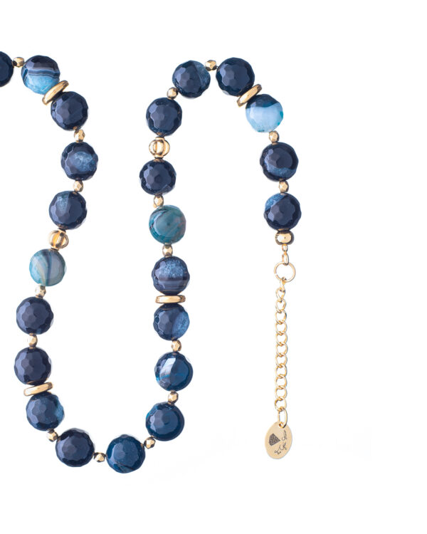 Blue jade necklace with gold accents and an extender chain